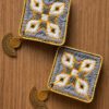 Grey and white geometric embroidered earrings with gold-tone fan-shaped drops