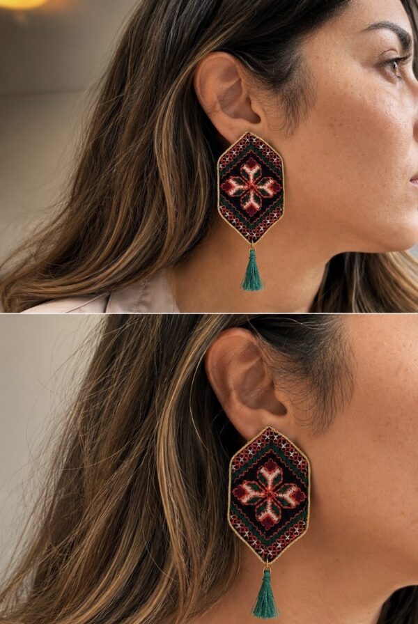 Model wearing red and green floral embroidered earrings with tassels