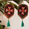 Red white and green floral embroidered shield earrings with green tassels