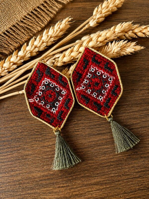 Red geometric embroidered earrings with grey-green tassels