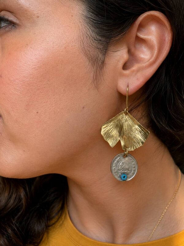 Handmade copper earrings with golden fan-shaped details, coin pendants and blue eye beads
